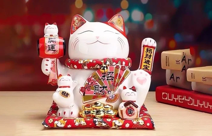 mèo thần tài tay trái