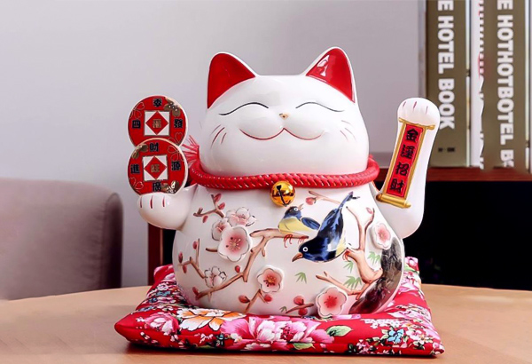 mèo maneki neko biểu tượng may mắn của nhật bản